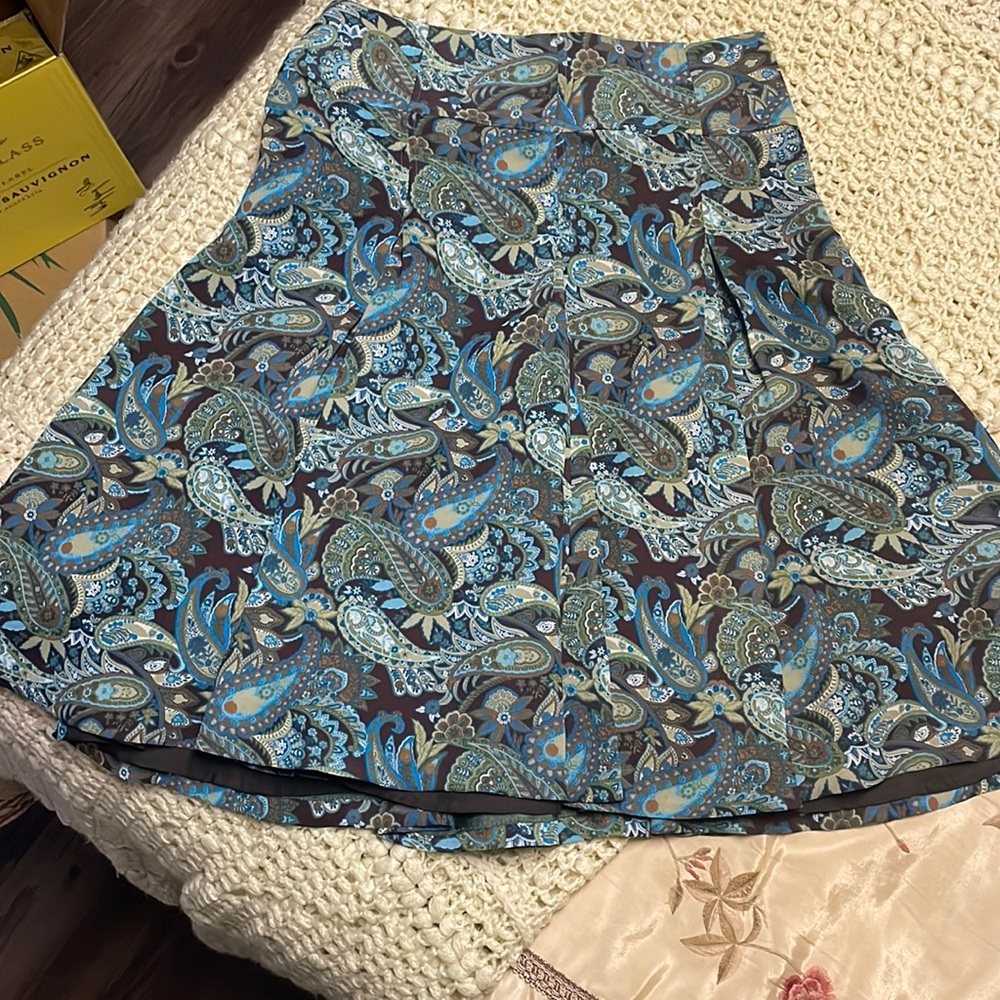 Togo pleated, lined skirt